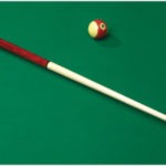 Junior Cue on a pool table